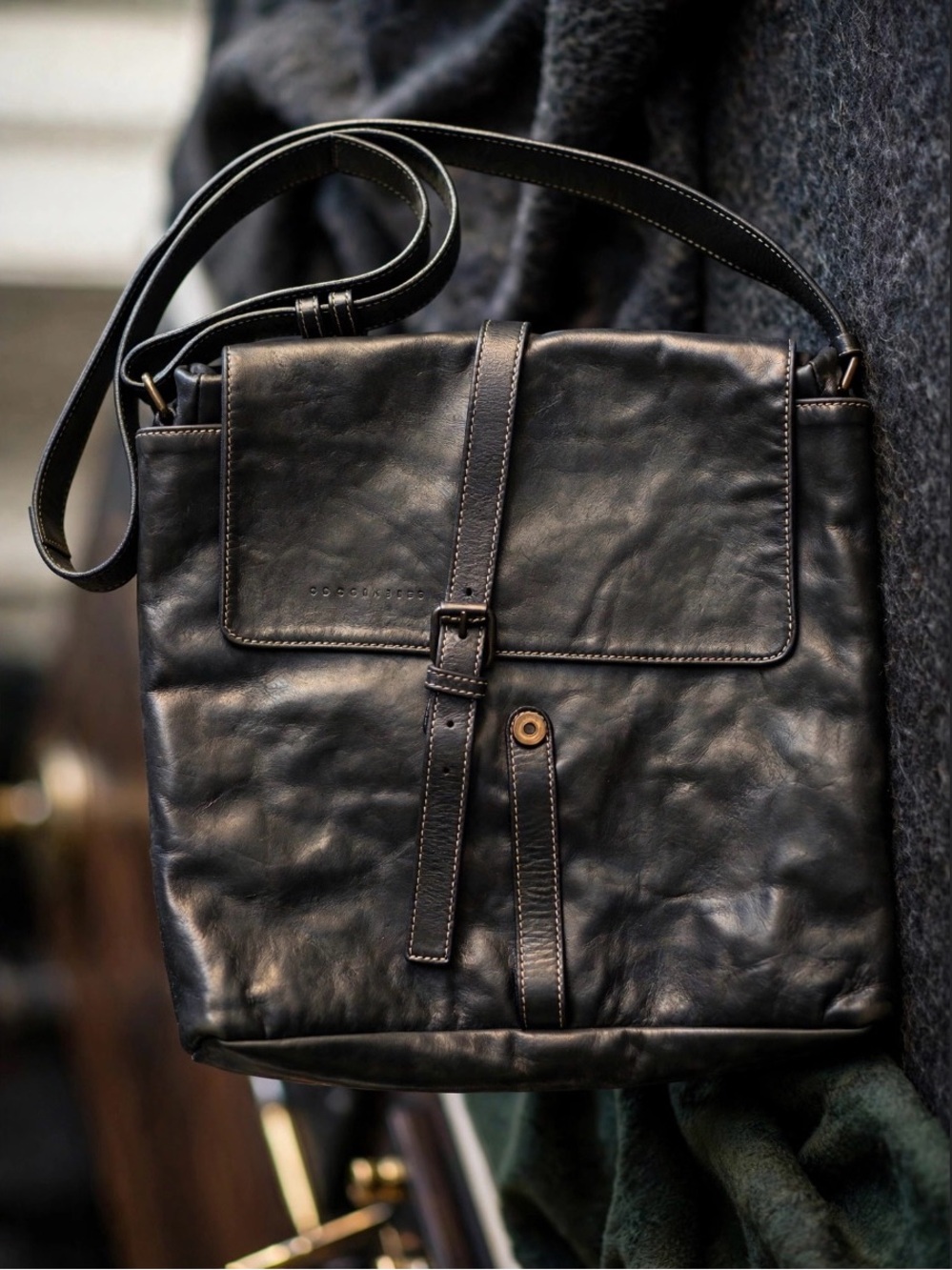 Classic Black Leather Messenger Bag with Buckle Strap